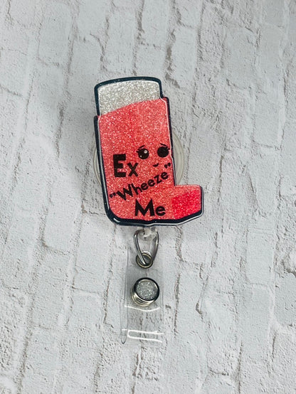 Ex Wheeze Me Badge Reel