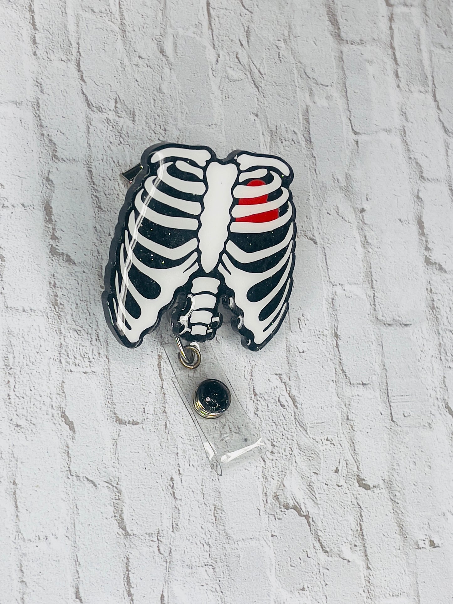 Rib Cage Badge Reel