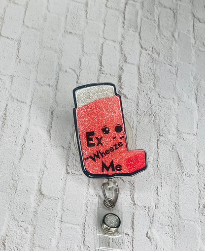 Ex Wheeze Me Badge Reel